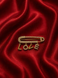 Spilla love
